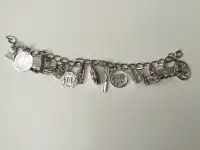 Vintage Sterling Silver Charm Bracelet with 14 Charms 
