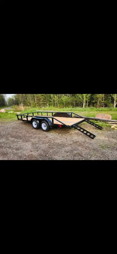 I have for sale a tandem axle trailer like new condition has a jack in front, stow away ramps deck s...