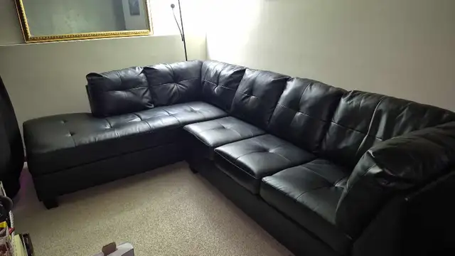 Black PV sectional couch 
