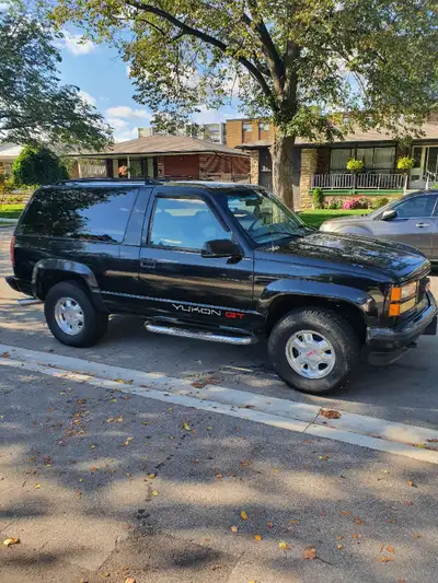 Rare Collectible. 1995 2 door GMC Yukon GT. Excellent condition. Black on grey leather. Front Seats...