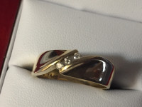 Solid yellow gold diamond ring. 14K...Size 9... 4.9 gm.....