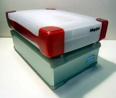 2 Maxtor External  Hard Drives  (JJD-074), View more
