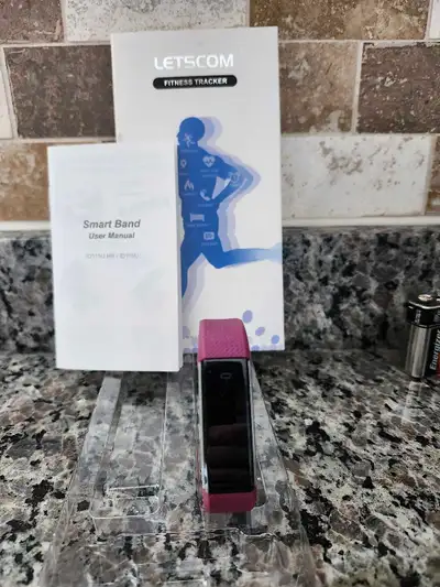 This is a Brand New Letscom Fitness Tracker, designed to help you monitor your activity levels, hear...