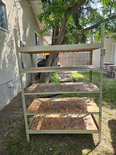 2 large shelving racks with metal frame and wooden shelves. Approx dimensions: 71.5 (h) x 48.5 (w) x...