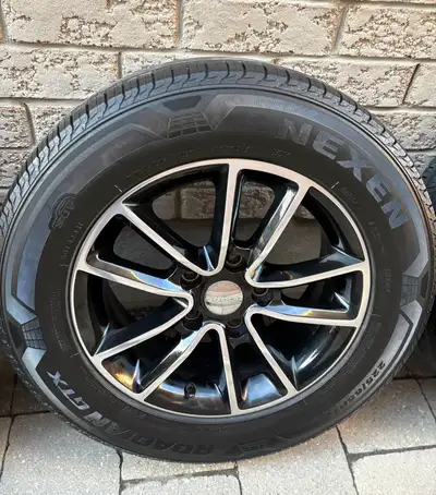 Tires and rims from a 2014 Grand Caravan Blacktop edition Excellent condition Never used in winter
