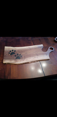 Cheese or charcuterie board with paw prints