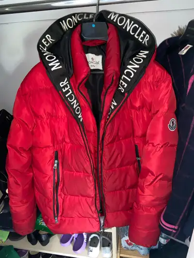 Stay warm and stylish in this eye-catching Moncler men's jacket, size XXL, featuring a bold red colo...