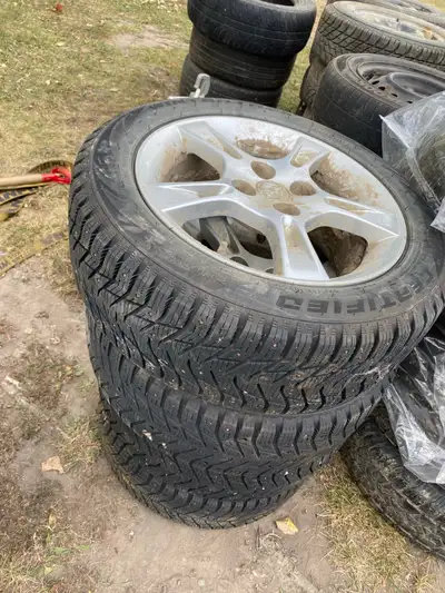 1st set: 195 55 15 studded on 4 bolt rims off a mazda car. $400 2nd set: 205 65 15 studded on 4 bolt...