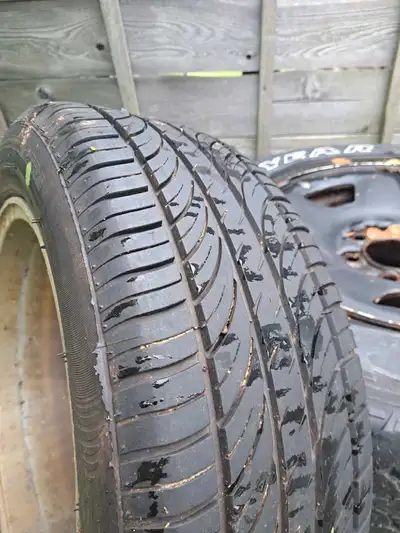 These are used Nissan tires and rims with a 205/55R16 91V tire size, perfect for someone looking for...