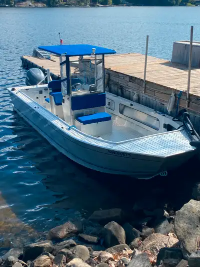 2003 24’ Stanley welded aluminum - Custom built centre console boat - $69,500 1/4” bottom with 3/16”...
