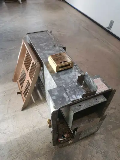 Small propane furnace for RV. Came out of my 20' Winnebago. Worked well before removal. Comes with t...