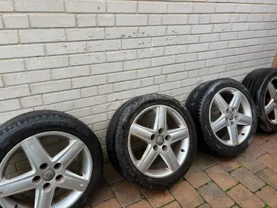 4 used Audi OEM Rims. Minor scratches. Excellent for daily use or Winter rims.