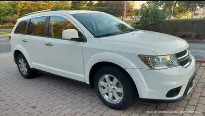 For Sale! -2016 Dodge Journey RT -7-Seater with leather seats -White exterior, sunroof, and backup c...