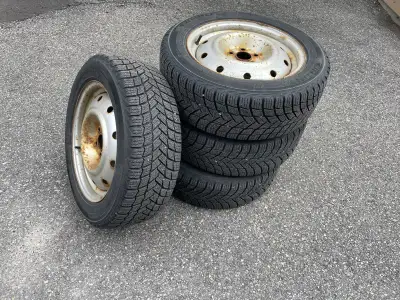 Winter tires off a Subaru Impreza and ready to switch onto yours in the fall. The tires fit many Cor...