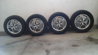 Like new 4 all season tires and rims for sale