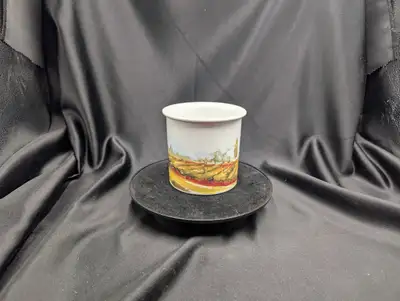 A Tuscan Village Dip Chiller, which is a ceramic container designed to keep dips cool. It consists o...