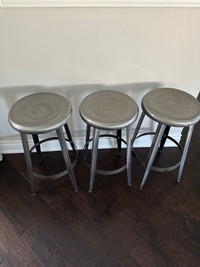  Set of three metal industrial style kitchen stools