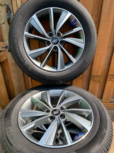 235/60R18 Michelin defender all season tires with Hyundai Santa Fe original factory rims The tires a...