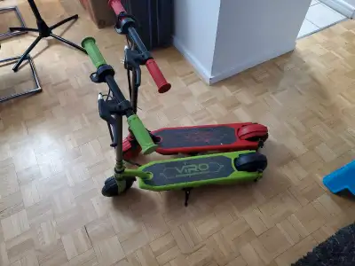 Viro rides electric scooter for kids. One red and one green avaliable. Price - 150 (each) Little Tik...
