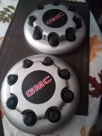 A pair (2 only) of GMC centre caps from a 4x4. Reduced to $20 for the pair.