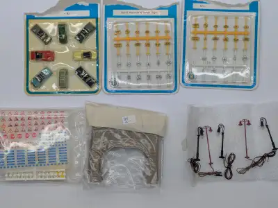 Selling a number of N scale accessories. Pricing below: Vehicles - $5 3 packages of signs - $5 for a...