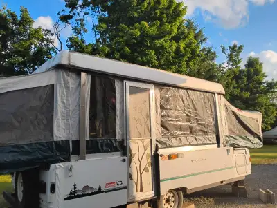 Hardtop top 10 trailer in good condition. Cranks up and down. One mattress could probably be upgrade...