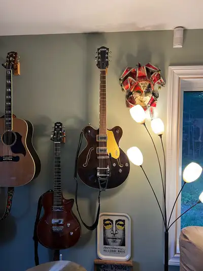 Virtually new. I have a lot of guitars and this one sounds and looks great but I have to let some go...