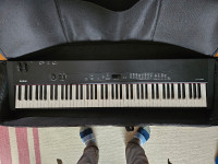 Yamaha Piano with Stand, Carry Case and Amp -PRICE REDUCED