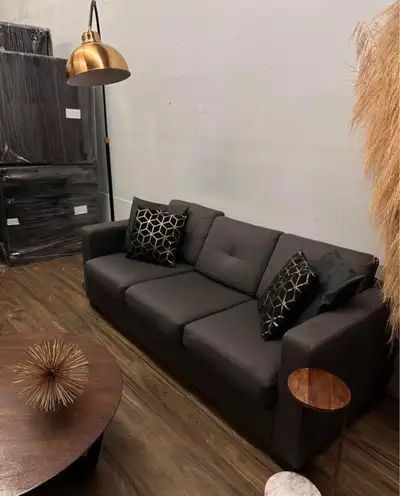 This stylish Eq3 sofa bed features a modern grey fabric and a convenient pull-out design, perfect fo...