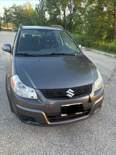 Selling my beloved, well maintained SX4 AWD hatchback. Safetied July 10th. 6 speed manual. 121,350 k...