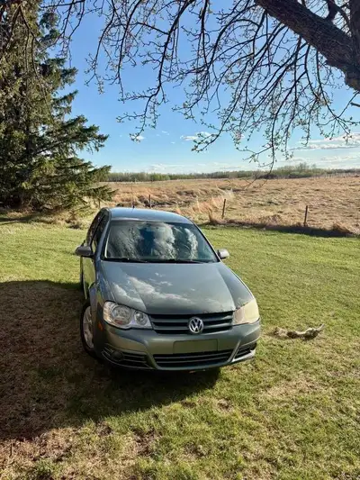 This is my 2009 volkswagon golf runs and drives body has a few rust spots and rear tail light is dam...