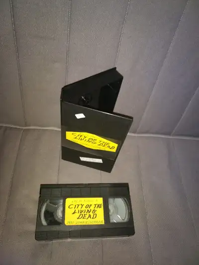 Vintage VHS tape... selling as a blank tape.......Lucio Fulci's...CITY OF THE LIVING DEAD.,aka..The...