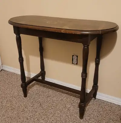 Top needs to be refinished. Used to have a rose design in the middle but hard to see with the wear....