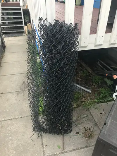 Black chain link. Perfect for a dog run. About 20ft., View more