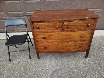 Antique 4 drawers dresser on the 4 metal wheels, View more