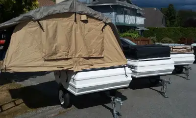 2014 UBilt utility tent trailer Ricker's Trailers with a Tent Stored in a garage. Only been used onc...