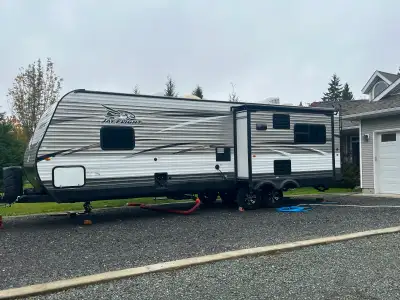 Very good condition. 2 slides front bedroom, fireplace New golf cart batteries