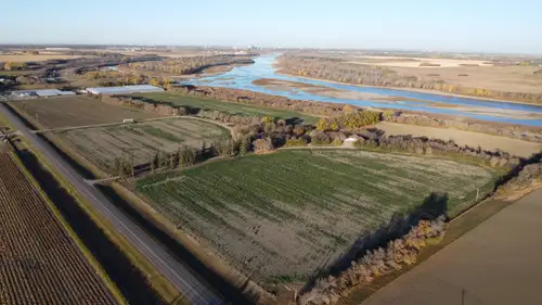 A rare Paved River Front development canvas just 2 miles south of Saskatoon. Five contiguous parcels...