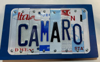 Signs made from recycled licence plates