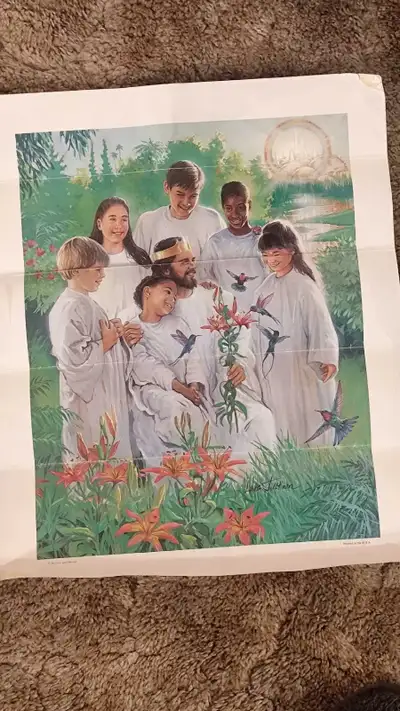 This art print features Jesus with a group of children and hummingbirds in a garden setting, capturi...