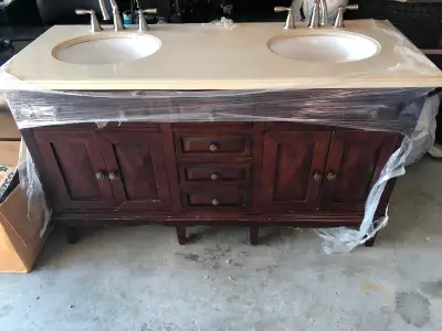 Double sink vanity with quartz counter top., View more