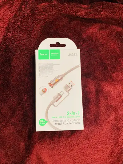 This brand new HOCO UA38B adapter is a 2-in-1 USB-A/USB-C to cigarette lighter adapter cable, perfec...