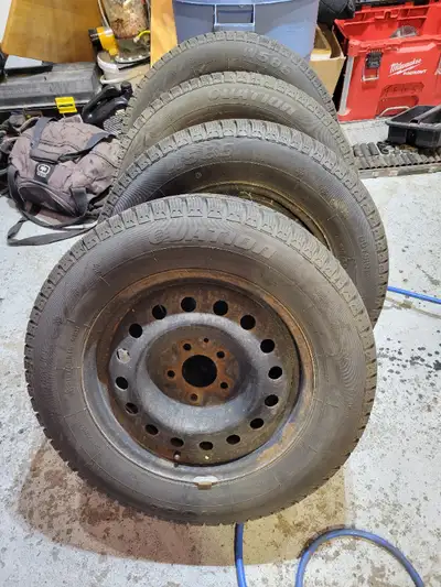 Snows on steel rims. Snows have been used for less than a season from new; next to no kms. Rims are...