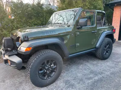 2023 Wrangler Willys Edition. Original Owner. Showroom condition. No accidents. Sarge green on black...