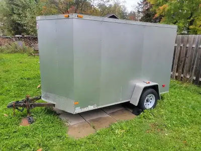2013, gray enclosed trailer 6'x10' plus 2' to V nose , 6' height, ramp, side door excellent conditio...