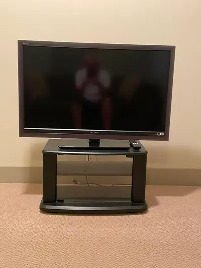Sony Bravia LCD 40” TV 1080p 60hz. Remote included Free TV stand. Original box for transporting. Wor...
