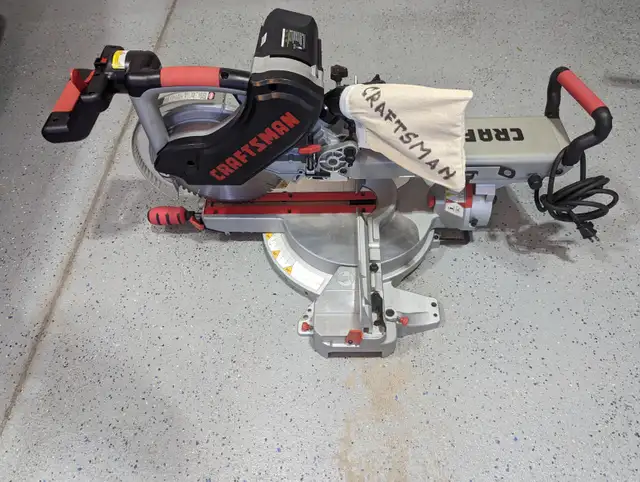 10 in. CRAFTSMAN SLIDING MITRE SAW with NEW STAND in Power Tools in London - Image 5