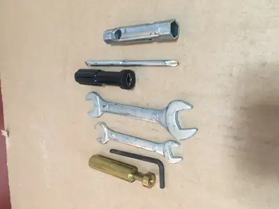 Original factory repair and adjustment tool kit. Includes drive belt tension gage. See pictures. $28...