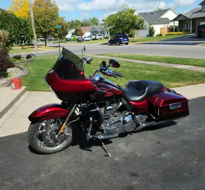 2011 CVO Roadglide Ultra touring, 110 cu engine. RIO Red, Black Ember with Quartz graphics..only 120...
