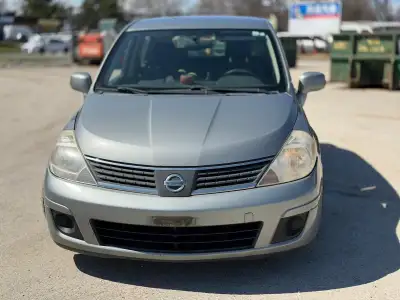 2007 Nissan versa 278km Runs and drives, rebuilt title, muffler hole. Exhaust sound. Come for cash F...